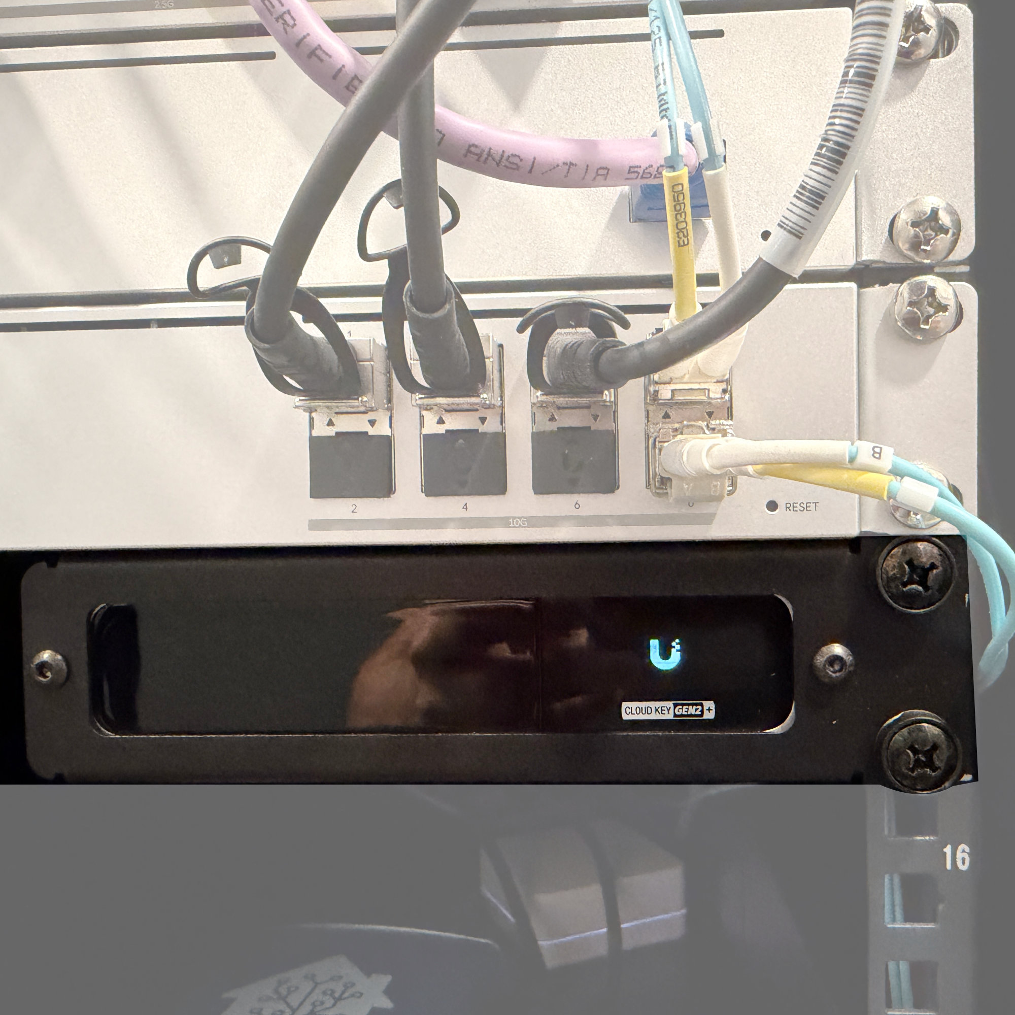 Unit installed in a server rack with a Cloud Key Gen2 installed and powered on
